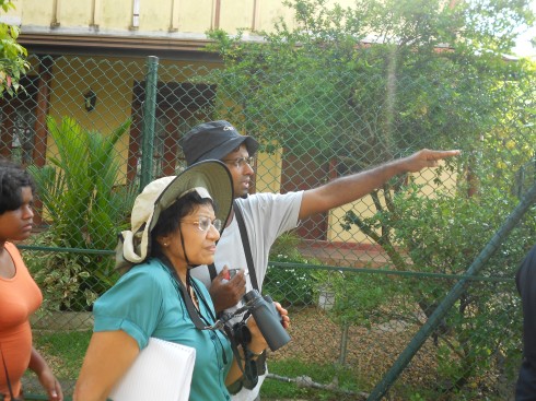 zBirding at Thalangama - 27.Oct - Dr.Sampath pointing at a bird